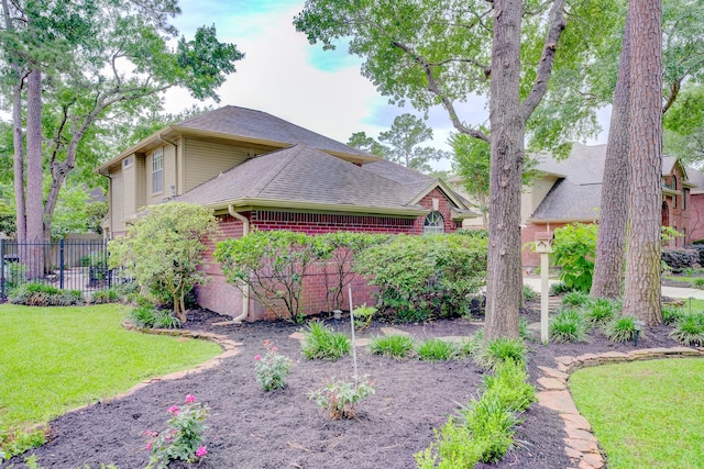 12911 Peach Meadow Dr, Cypress, TX 77429 - view of side of home with roof with shingles and brick siding