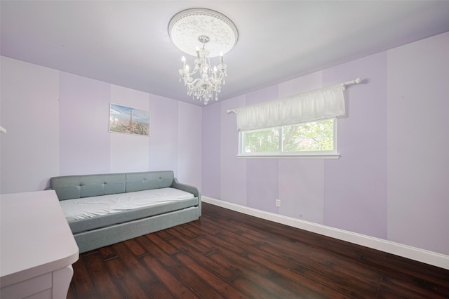 715 Cheltenham Dr, Katy, TX 77450 - sitting room with a chandelier, wood-type flooring, and baseboards