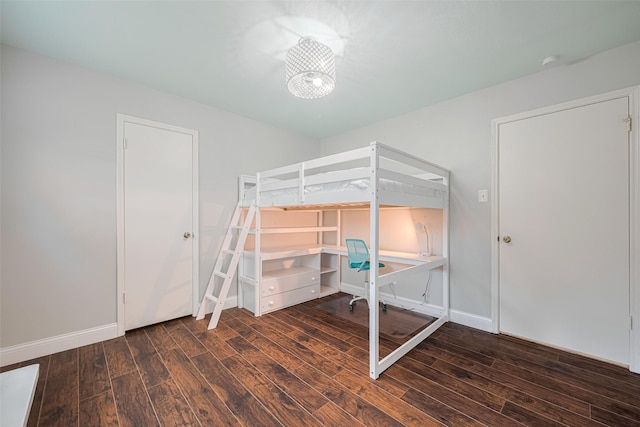715 Cheltenham Dr, Katy, TX 77450 - bedroom featuring wood finished floors, a desk, and baseboards