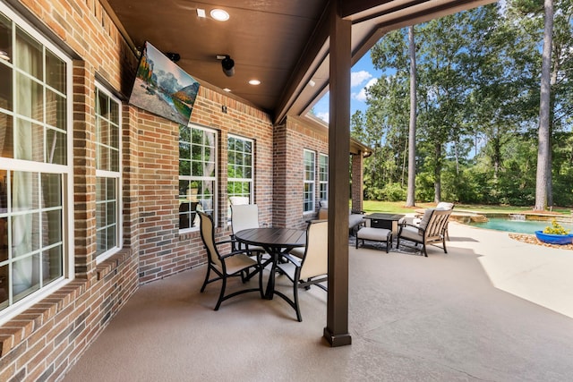 4810 Pine Wood Meadows Ln, Spring, TX 77386 - view of patio featuring ceiling fan, an outdoor pool, and outdoor dining area