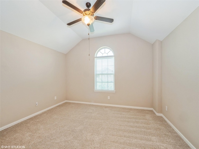 1322 Tee Time Ct, Crosby, TX 77532 - carpeted empty room featuring ceiling fan, lofted ceiling, and baseboards