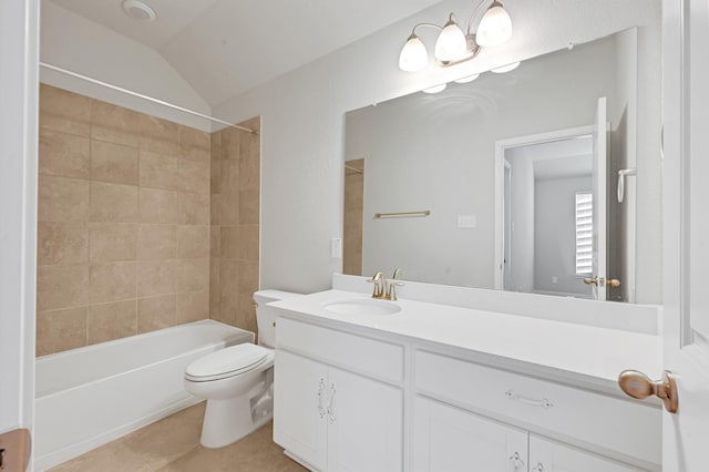 11826 Tranquility Summit Dr, Cypress, TX 77433 - bathroom featuring toilet, tile patterned flooring, vanity, lofted ceiling, and tub / shower combination