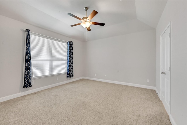 11826 Tranquility Summit Dr, Cypress, TX 77433 - spare room featuring light colored carpet, ceiling fan, baseboards, and vaulted ceiling