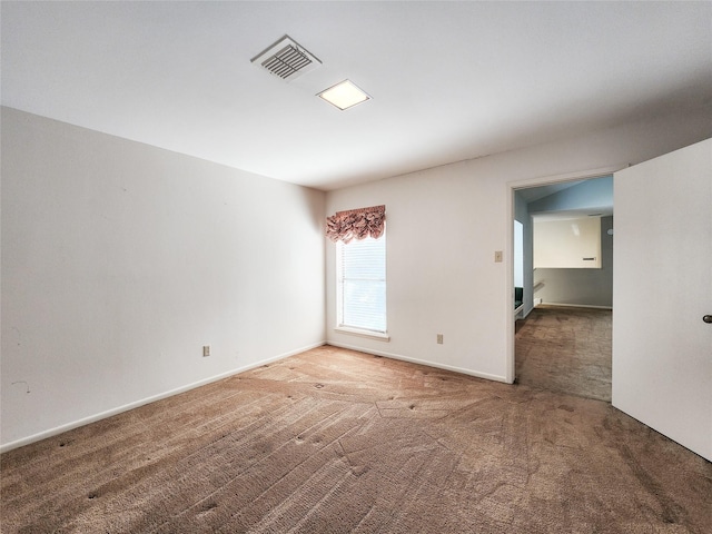 7910 Woodway Dr, Houston, TX 77063 - carpeted spare room featuring baseboards