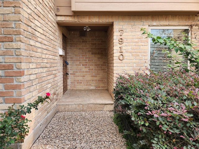 7910 Woodway Dr, Houston, TX 77063 - entrance to property with brick siding