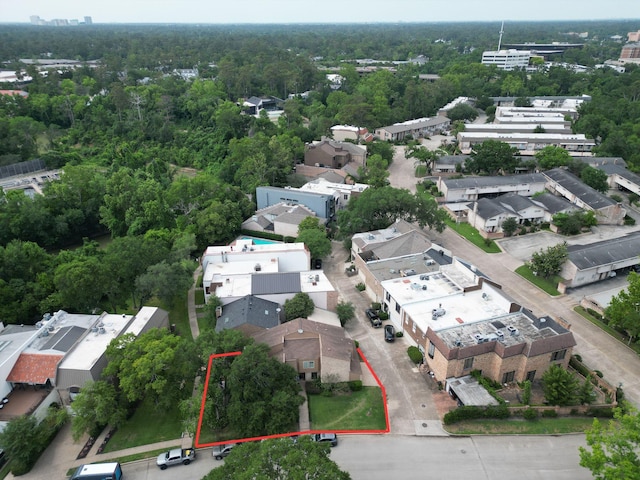 7910 Woodway Dr, Houston, TX 77063 - aerial view of property's location featuring property parcel outlined and a heavily wooded area