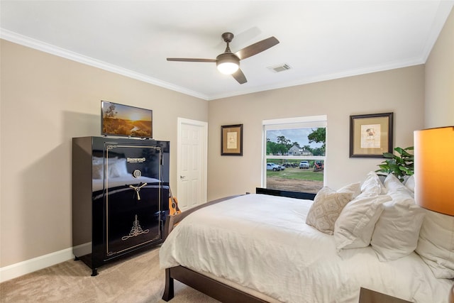 3315 E Bayou Dr, Shoreacres, TX 77571 - bedroom with light colored carpet, ornamental molding, and ceiling fan