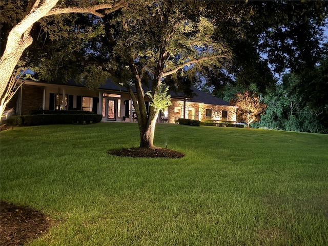 3315 E Bayou Dr, Shoreacres, TX 77571 - ranch-style house with a front yard