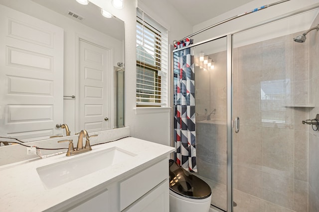 28946 Parker Ridge Dr, Katy, TX 77494 - full bath featuring a stall shower, vanity, and toilet