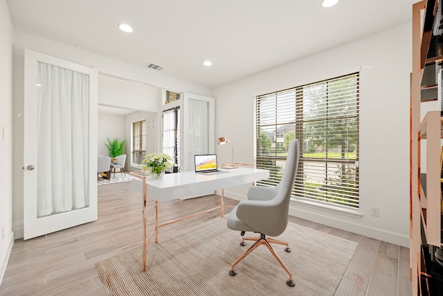 28946 Parker Ridge Dr, Katy, TX 77494 - office with healthy amount of natural light, light wood-type flooring, recessed lighting, and baseboards