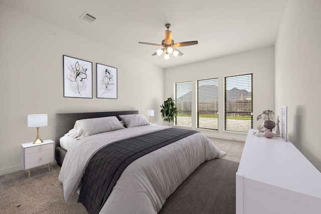 28946 Parker Ridge Dr, Katy, TX 77494 - carpeted bedroom with baseboards and a ceiling fan