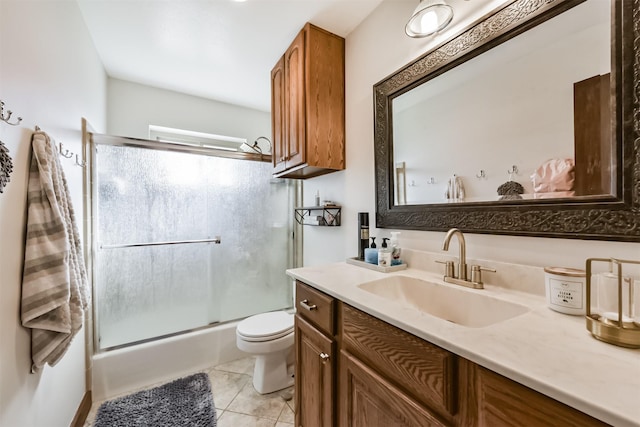 12938 Dermott Dr, Houston, TX 77065 - full bath with toilet, vanity, tile patterned floors, and shower / bath combination with glass door