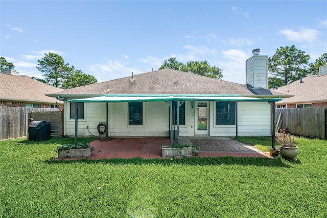 14925 Cypress Ridge Grove Ln, Cypress, TX 77429 - rear view of property featuring a patio area, a chimney, and roof with shingles