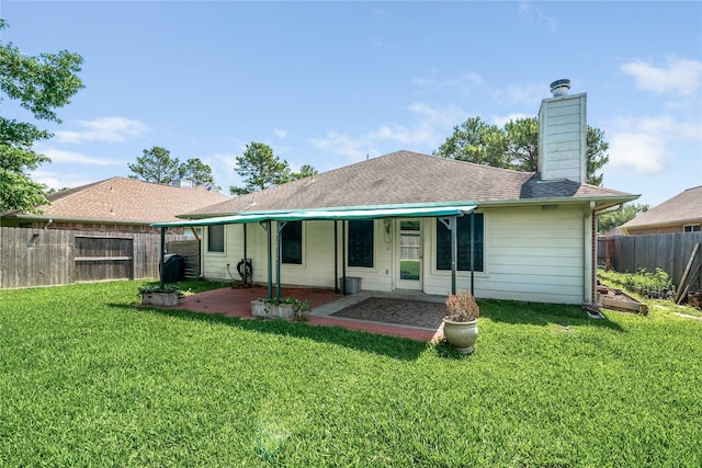 14925 Cypress Ridge Grove Ln, Cypress, TX 77429 - back of property featuring a patio and a chimney