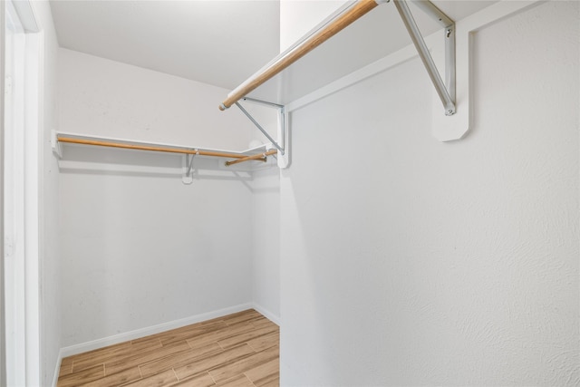 14925 Cypress Ridge Grove Ln, Cypress, TX 77429 - spacious closet featuring light wood-style flooring