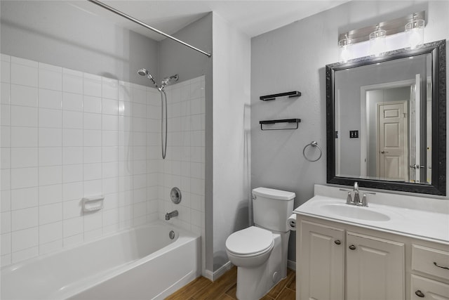 14925 Cypress Ridge Grove Ln, Cypress, TX 77429 - full bathroom with wood finished floors, toilet, vanity, and bathing tub / shower combination