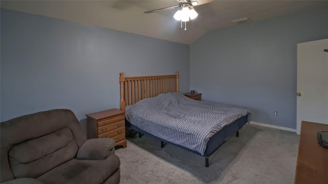 carpeted bedroom with lofted ceiling, a ceiling fan, and baseboards
