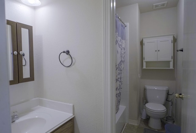 full bathroom with toilet, vanity, shower / bathtub combination with curtain, and tile patterned floors