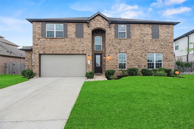 2411 Jitterbug Ln, Katy, TX 77493 - traditional home with driveway, an attached garage, and brick siding