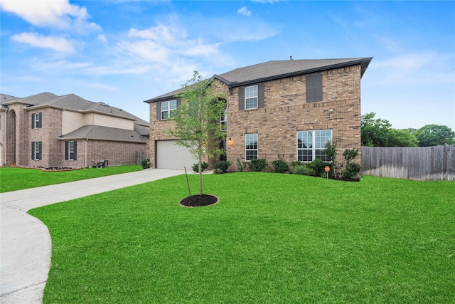 2411 Jitterbug Ln, Katy, TX 77493 - traditional-style home with concrete driveway, brick siding, and a garage