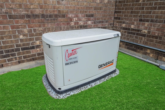 2411 Jitterbug Ln, Katy, TX 77493 - exterior view of a power unit and brick siding