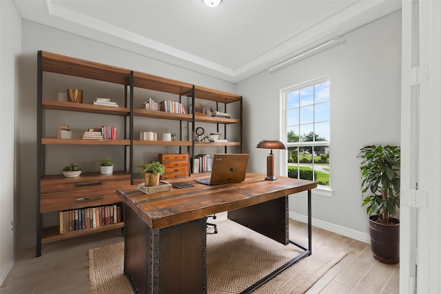 2411 Jitterbug Ln, Katy, TX 77493 - office area featuring baseboards and light wood-style floors