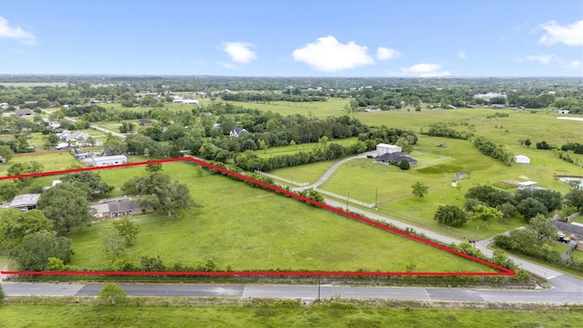 6825 Highland Rd, Santa Fe, TX 77517 - aerial view of sparsely populated area featuring property parcel outlined and a tree filled landscape