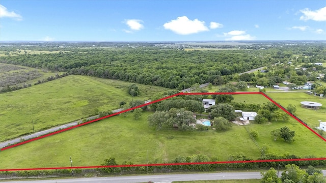 6825 Highland Rd, Santa Fe, TX 77517 - view of rural area with property boundaries highlighted and a forest