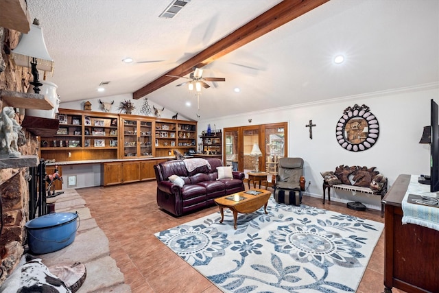 6825 Highland Rd, Santa Fe, TX 77517 - living room featuring a ceiling fan, crown molding, light tile patterned flooring, a fireplace, and a textured ceiling