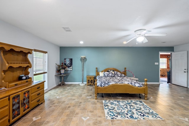 6825 Highland Rd, Santa Fe, TX 77517 - bedroom featuring baseboards, light tile patterned floors, recessed lighting, and ceiling fan