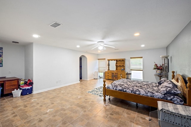 6825 Highland Rd, Santa Fe, TX 77517 - bedroom featuring arched walkways, recessed lighting, and ceiling fan