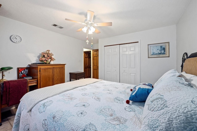 6825 Highland Rd, Santa Fe, TX 77517 - bedroom featuring a closet and a ceiling fan