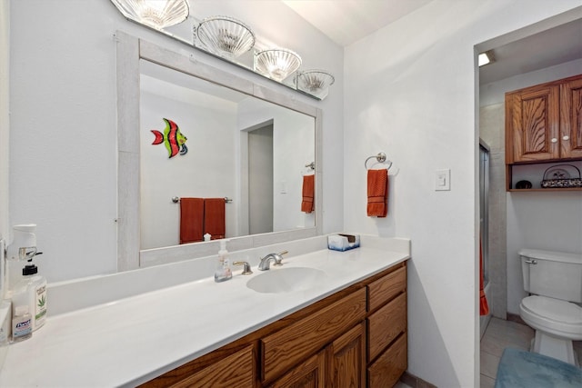 6825 Highland Rd, Santa Fe, TX 77517 - bathroom with toilet, vanity, a shower, and tile patterned flooring