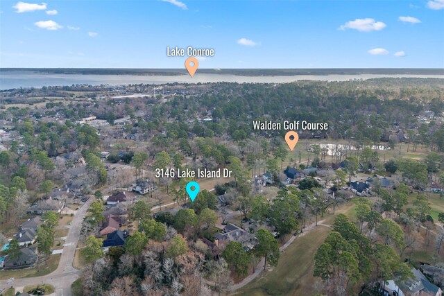 aerial overview of property's location with a large body of water