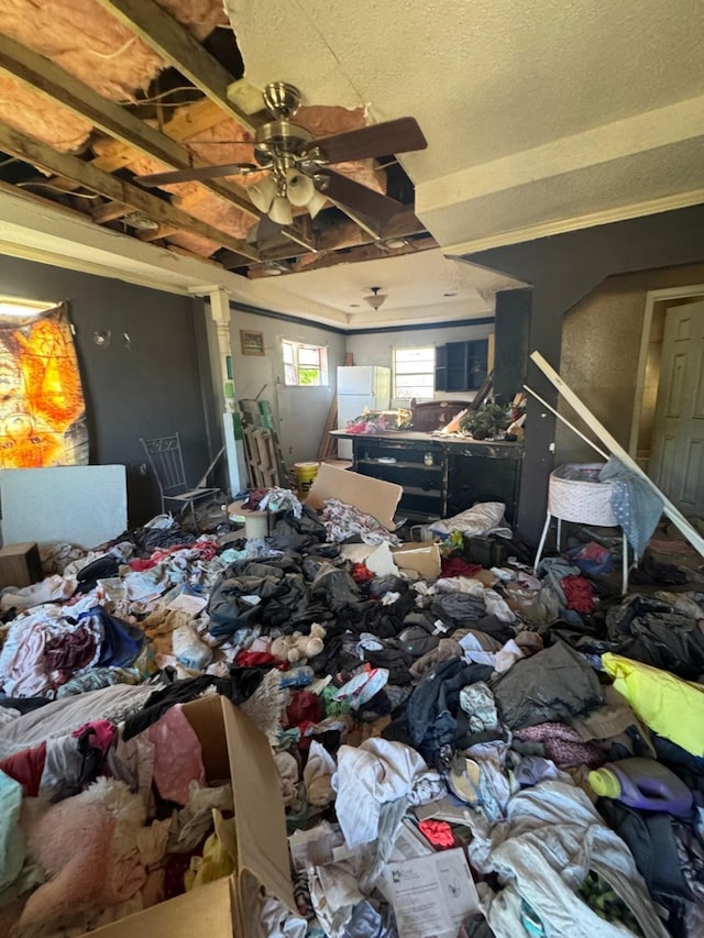 miscellaneous room featuring a ceiling fan