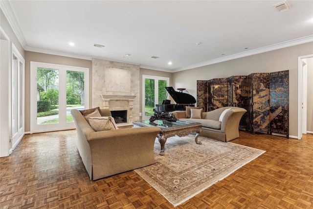 living room with a large fireplace, recessed lighting, crown molding, and baseboards