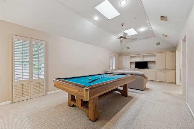 playroom featuring a skylight, billiards, light colored carpet, lofted ceiling, and a ceiling fan