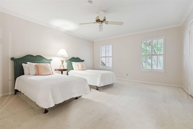 bedroom with ornamental molding, light carpet, baseboards, and a ceiling fan