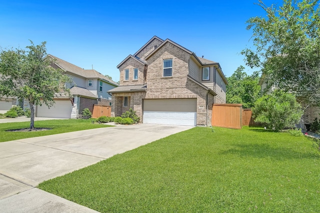 traditional-style home with brick siding, driveway, and a garage