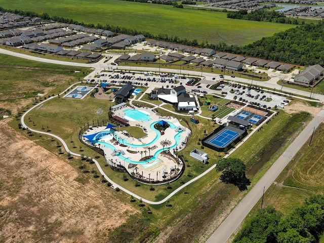 aerial view of residential area featuring a pool