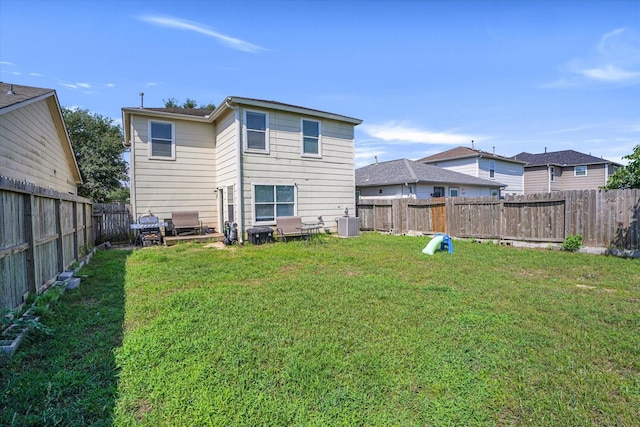 rear view of property featuring cooling unit