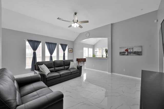 living area with light marble finish flooring, ceiling fan, baseboards, and lofted ceiling