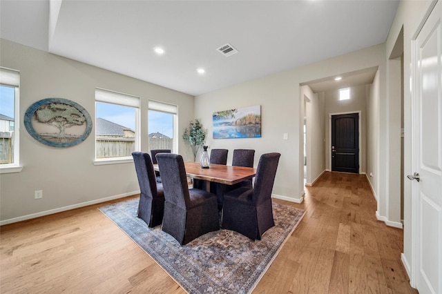 22110 Sam Raburn Dr, Tomball, TX 77375 - dining space featuring light wood-style floors, baseboards, and recessed lighting