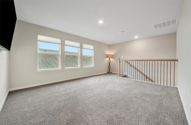 22110 Sam Raburn Dr, Tomball, TX 77375 - unfurnished room featuring carpet flooring, baseboards, and recessed lighting