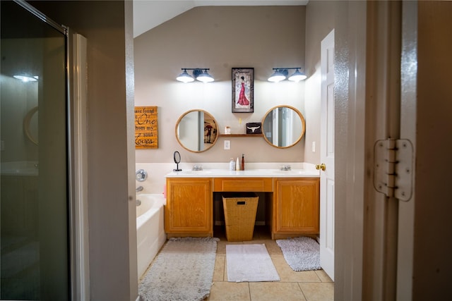 32102 Annice Ln, Pinehurst, TX 77362 - full bathroom featuring a shower stall, double vanity, a bath, tile patterned floors, and lofted ceiling
