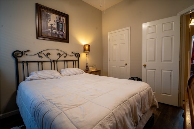 32102 Annice Ln, Pinehurst, TX 77362 - bedroom featuring wood finished floors and lofted ceiling