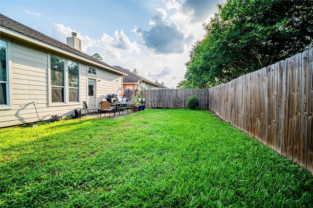 32102 Annice Ln, Pinehurst, TX 77362 - view of yard with a patio