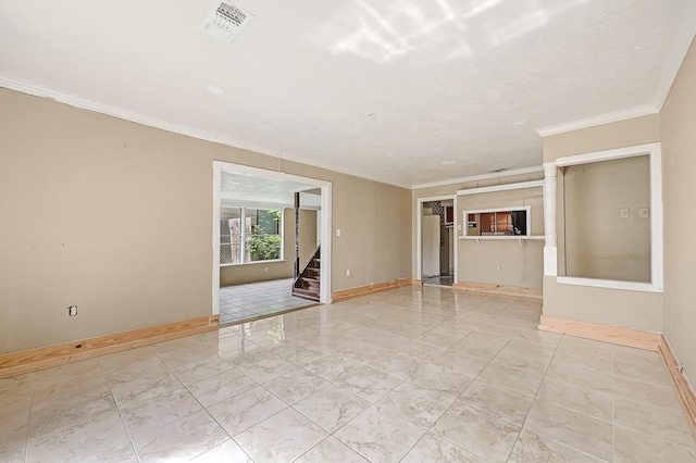 unfurnished living room featuring baseboards, crown molding, stairway, and marble look tiles