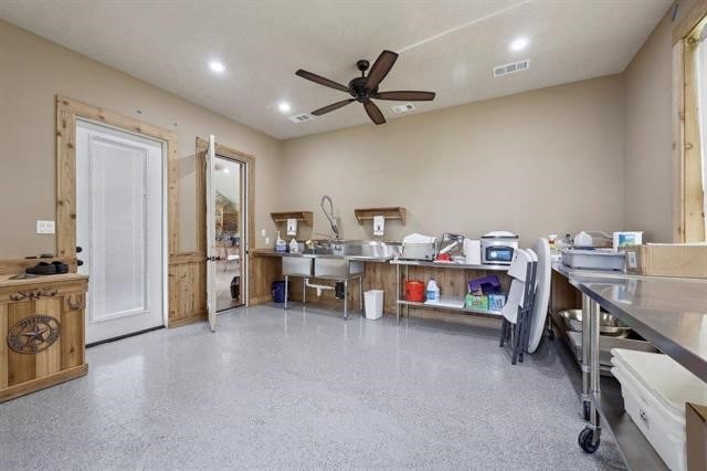 2014 Fish Lake Rd, Kountze, TX 77625 - miscellaneous room featuring speckle patterned floor, a ceiling fan, and recessed lighting
