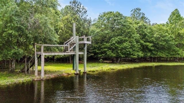 2014 Fish Lake Rd, Kountze, TX 77625 - view of community featuring stairs and a water view
